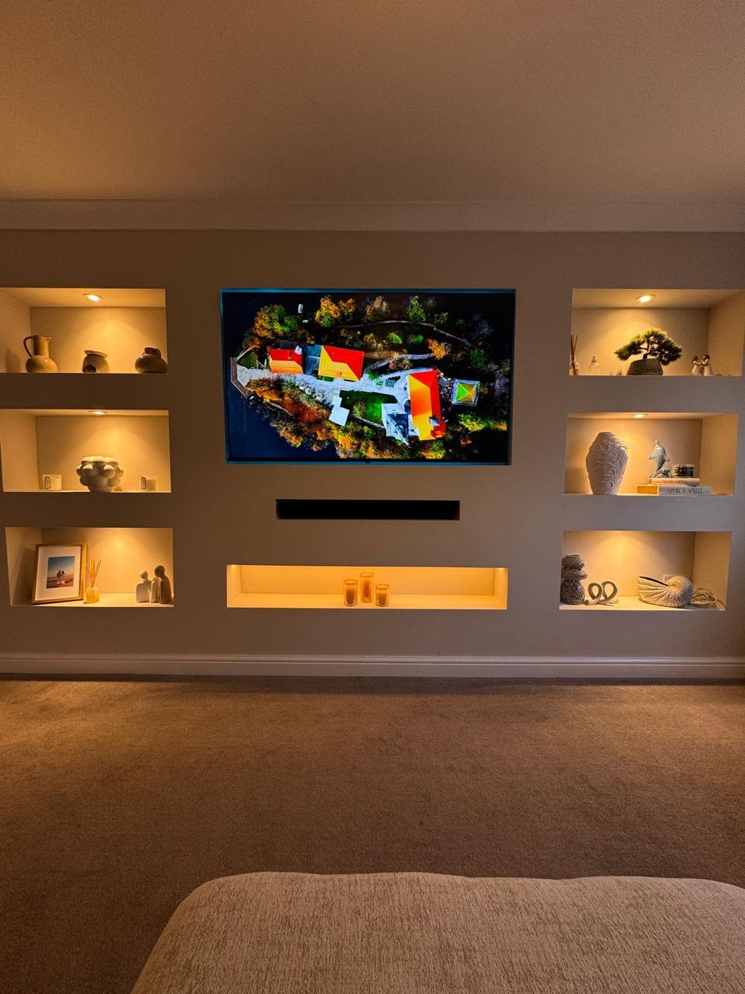 Media wall shelf lighting